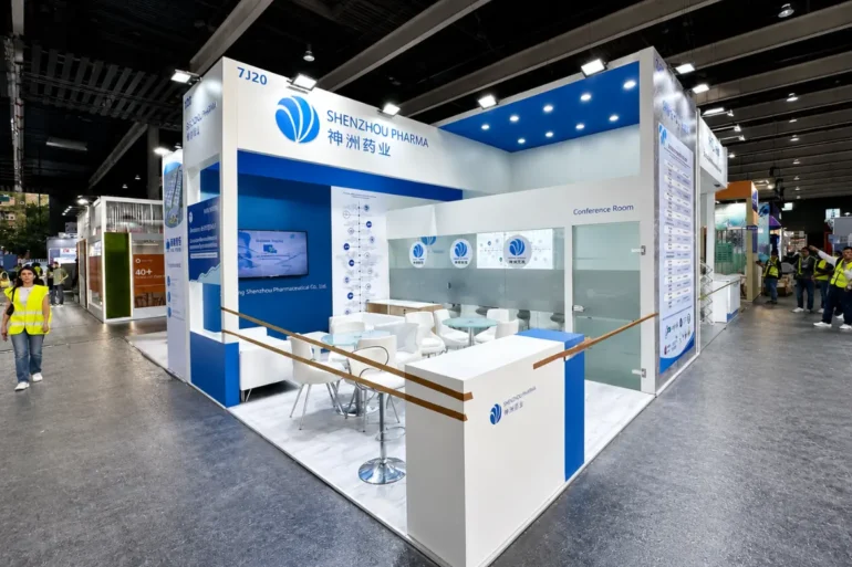 CPHI Worldwide 2023 Barcelona, Spain This is an image of a premium white and blue exhibition stand that was designed and built by Skyline Events at CPHI Worldwide 2023 in Barcelona, Spain. Which Represent Skyline Events as the best exhibition stand builder in Spain.