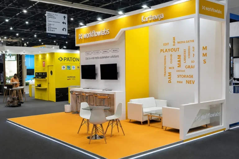 Cabsat 2024, Dubai, UAE This is a premium white and yellow exhibition stand designed and built by Skyline Events for Cabsat 2024 in Dubai, UAE. It serves as a testament to why Skyline Events is the best exhibition stand-building company in the UAE